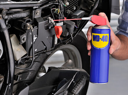 WD-40 mup displaces moisture